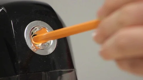 Close up of an electric pencil sharpener in use at an office Stock Footage 88488136