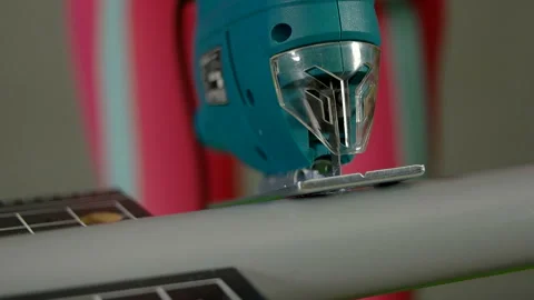 Close-up of an electric saw cuts off a plastic pipe 스톡 동영상 89177425