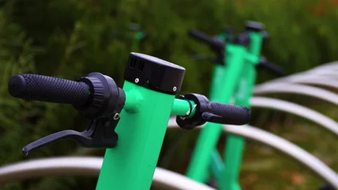 A close up of a electric scooter with black handlebars Stock Footage 235450141