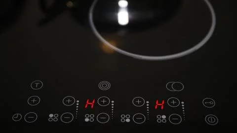 Close up of electric stove control panel Stock Photos