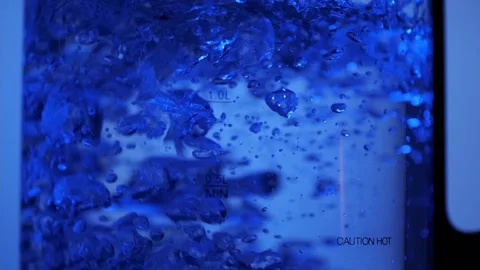 Close Up of electric tea Kettle boiling in slow-motion Stock Footage 157742569
