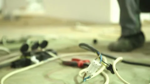 Close up electric technician fixing cables Stock Footage 128929041