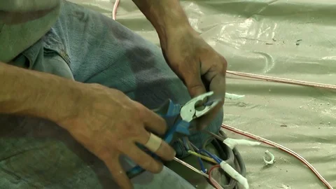 Close up electric technician fixing cables Video stock 128929378
