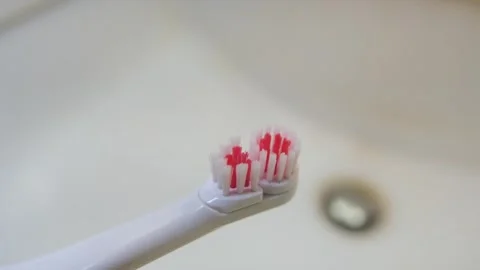 Close up of a electric toothbrush Stock Footage 330373225