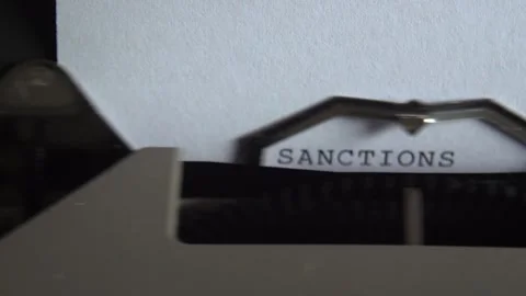 Close-Up Electric Typewriter Typing 'Sanctions Russia' 스톡 동영상 277231916
