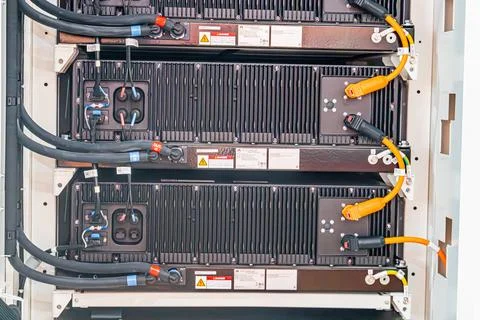 Close-up of electrical assembly with color-coded cords, red and blue connecto 스톡 사진