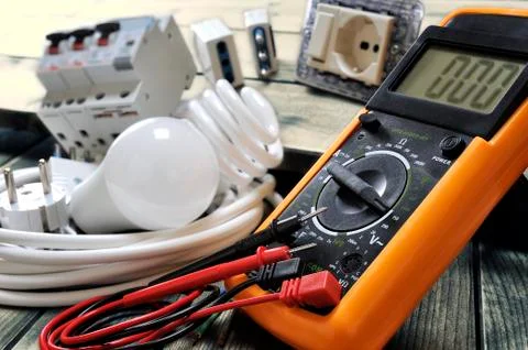 Close-up of electrical components and equipment on aged wooden background Stock Photos