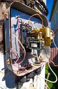 Close-up of an electrical panel and street meter on a rusted outdoor utilit.. Stock Photos
