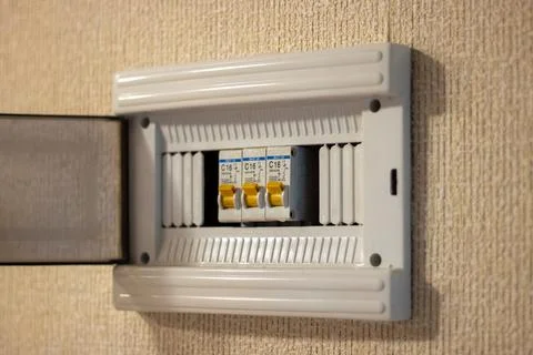Close-up of an electrical panel with circuit breakers in the apartment Stock Photos