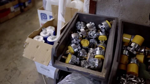 Close up of electrical pieces in plastic container Видео 331272084