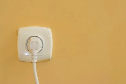 Close Up the electrical power socket and plug socket on wall. 스톡 사진