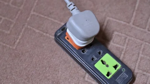 Close Up of Electrical Power Strip with Plug Connected to Extension Socket o Stock Footage 337136557