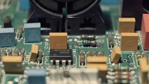 A close-up of an electrician repairing computer components. Stock Footage 145678254