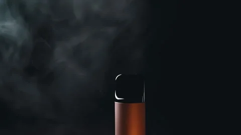 Close-up, Electronic Cigarette or Vape in Smoke on Black Background Stock Footage 312014282