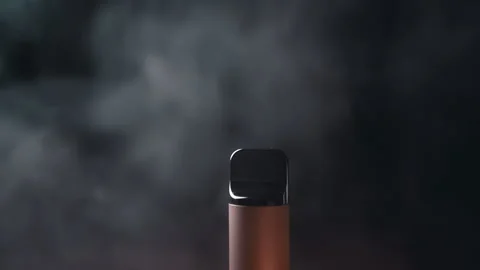 Close-up, Electronic Cigarette or Vape in Smoke on Black Background Stock Footage 312014486