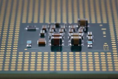 Close-Up of Electronic Circuit Components on a Microchip Surface Stock Photos