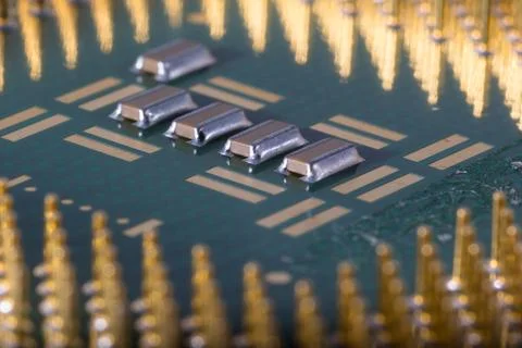 Close-Up of Electronic Circuit Components on a Microchip Surface Stock Photos