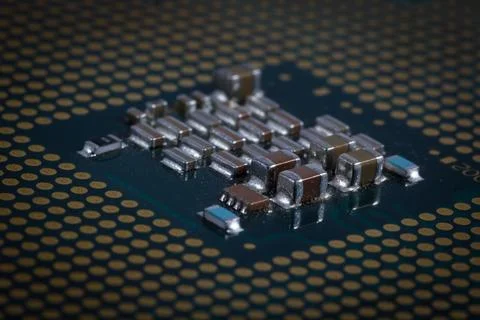 Close-Up of Electronic Circuit Components on a Microchip Surface Stock Photos