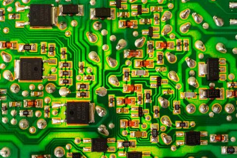 Close-up of an electronic printed green computer circuit board. Stock Photos