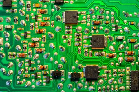 Close-up of an electronic printed green computer circuit board. Stock Photos