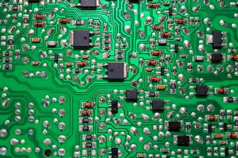 Close-up of an electronic printed green computer circuit board. Stock Photos