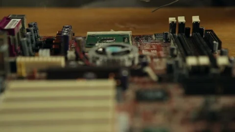 Close up of an electronics engineer soldering an electric board. Stock Footage 88365502