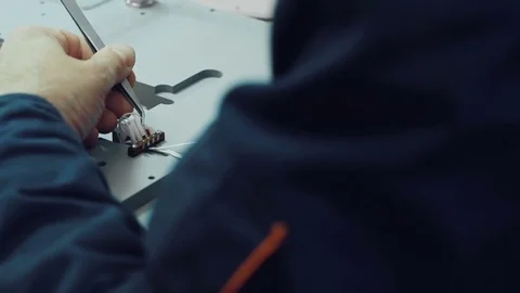 Close up of electronics engineer working with a circuit board Stock Footage 80826374