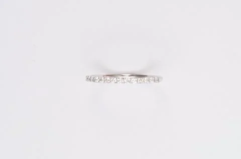 Close up of elegant diamond ring on the white background. Diamond ring. Stock Photos