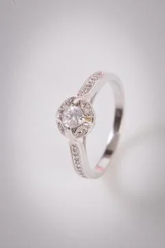 Close up of elegant diamond ring on the white background. Diamond ring. Stock Photos