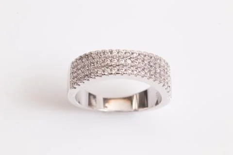 Close up of elegant diamond ring on the white background. Diamond ring. Stock Photos