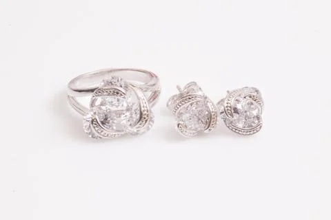 Close up of elegant diamond ring on the white background. Diamond ring. Stock Photos