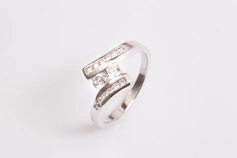 Close up of elegant diamond ring on the white background. Diamond ring. Stock Photos