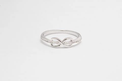 Close up of elegant diamond ring on the white background. Diamond ring. Stock Photos