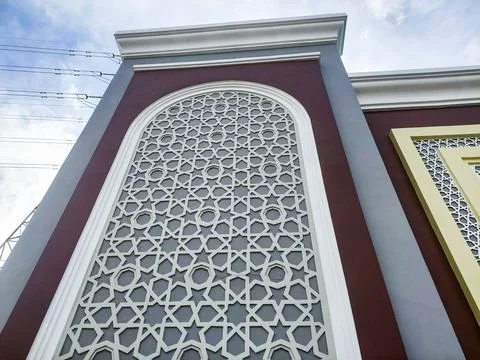 Close-up of elegant mosque wall texture featuring Islamic geometric pattern.. Stock Photos