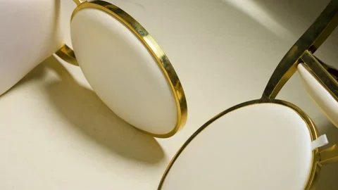 Close up of elegant white round padded event chairs with gold metal frames Stock Footage 332226755