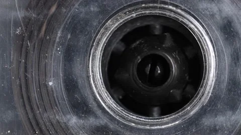 Close-up element of audio cassette. Macro rotation of the reel with audio tape Stock Footage 147668772