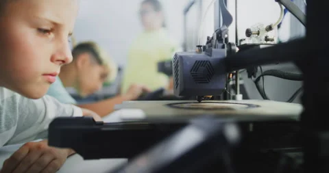 Close Up of Elementary School Boy Using 3D Printer Touchscreen, Learning Stock Footage 314778107
