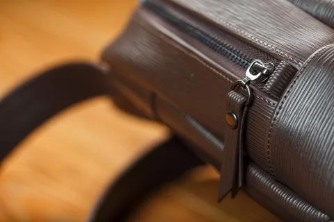 Close-up of the elements of the bag, backpack made of genuine leather with be Stock Photos