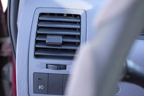 Close-up elements of the instrument panel made of gray plastic Stock Photos