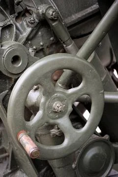 Close-up of elevating hand-wheel of a soviet artillery gun. Stock Photos