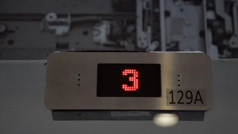 CLOSE UP TO AN ELEVATOR DISPLAY Video stock 107301530