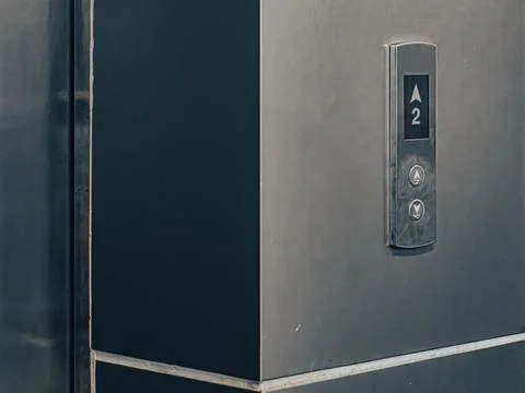 Close-Up of Elevator Floor Button Panel with Up-Down Arrows and Digital Displ Stock Photos