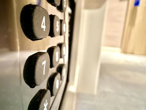 Close-Up of Elevator Number Buttons in Soft Focus Stock Photos