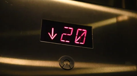 Close up of elevator numbers descending Stock Footage