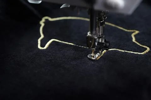 Close up of embroidery machine stitching 2019 chinese new year pig Stock Photos