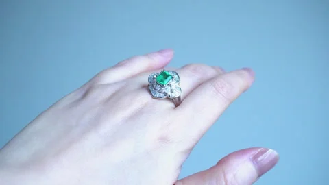 Close-up of emerald ring on hand Stock Footage 331768803