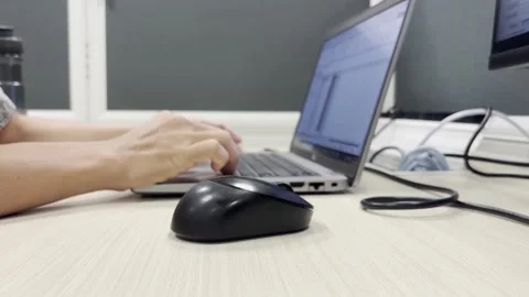 Close Up of Employee Hand Using Computer Mouse at Office Desk Video stock 336396353