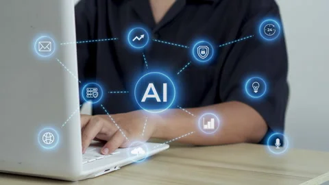 Close up of employee typing on laptop while visualization of artificial Stock Footage 345844385