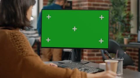 Close up of employee using computer with green screen Stock Photos