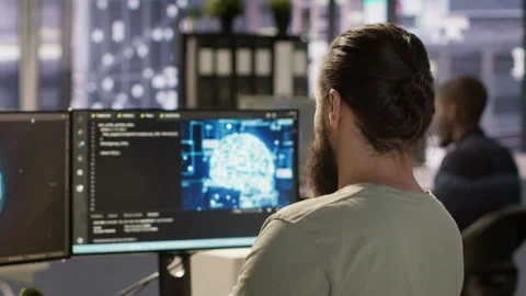 Close up of employee working with AI deep neural networks Stock Footage 318228257